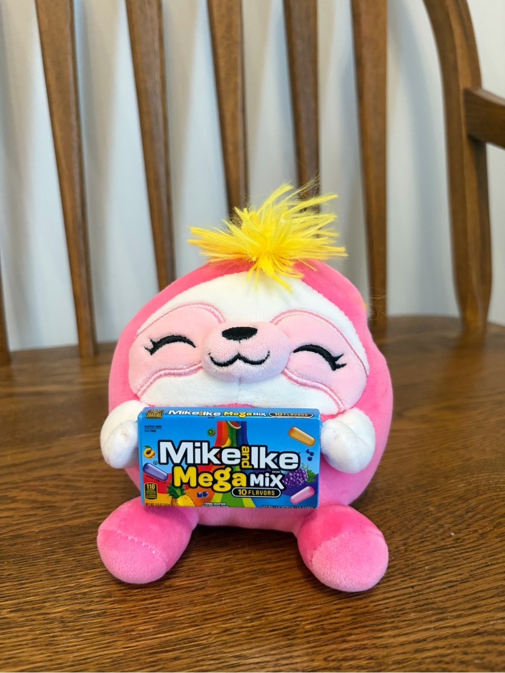 Zuru Snackles Susie the Sloth 5 Inch Plush holding Mike and Ike Candy Box